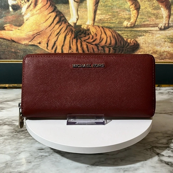 Michael Kors Handbags - MICHAEL KORS ZIPPY WALLET IN GUC